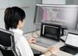 Informatik Student vor PC